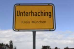 Sonniges Baugrundstück mit Altbestand in Unterhaching zu verkaufen